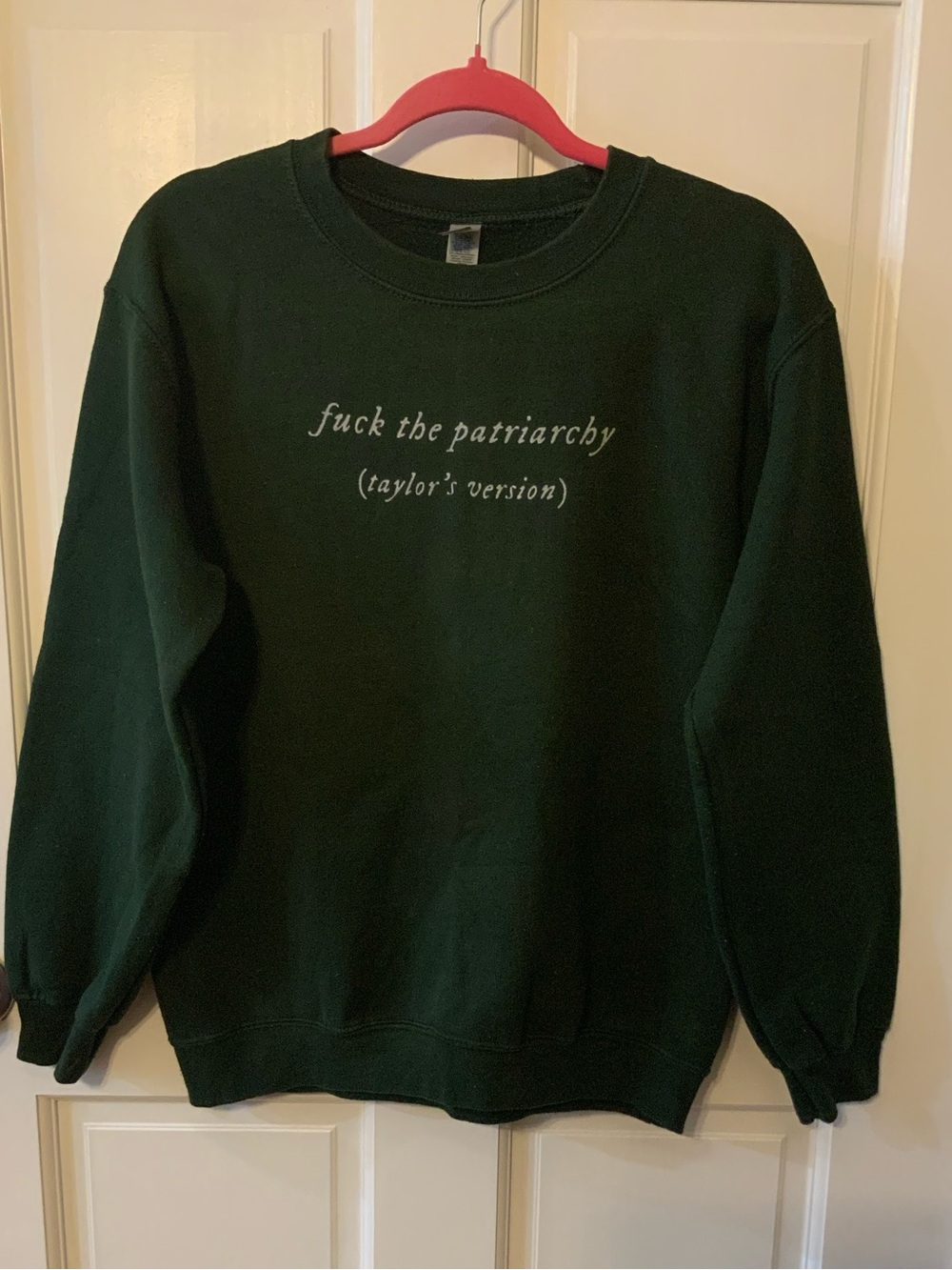 Gildan Dark Green Crewneck Sweatshirt with *f” the patriarchy Taylor’s version.